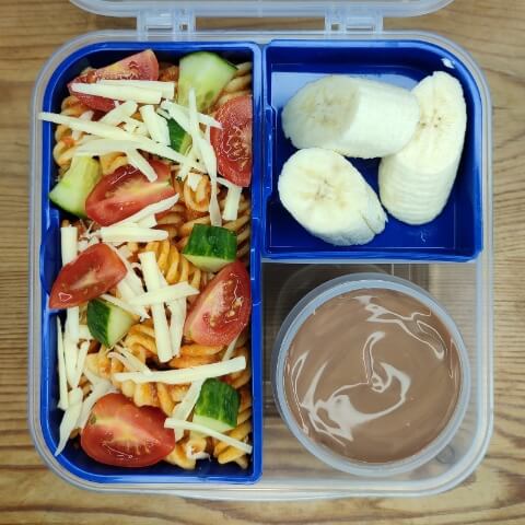 Pasta salad with banana and chocolate custard