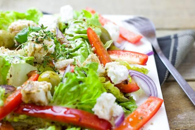 A vibrant salad full of healthy vegetables.