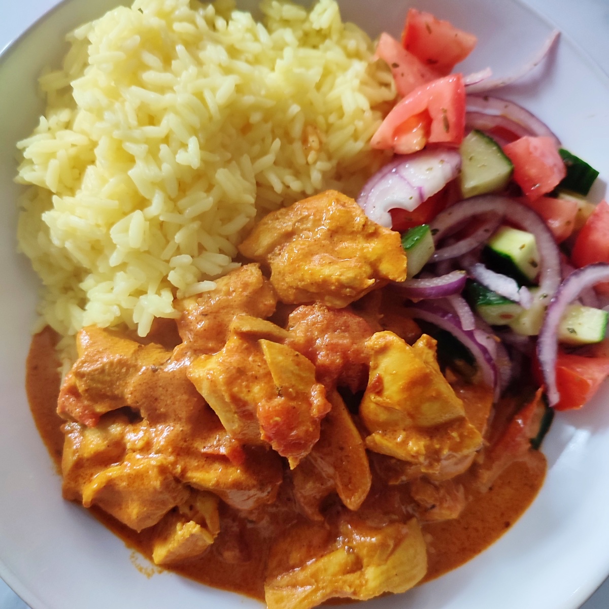 Butter Chicken Curry with rice and salad