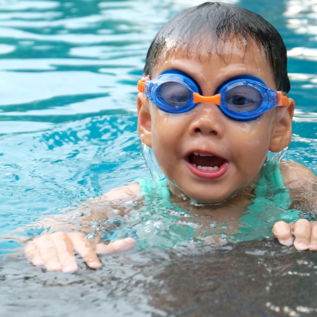 Small boy swimming