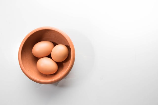 a bowl with 3 eggs