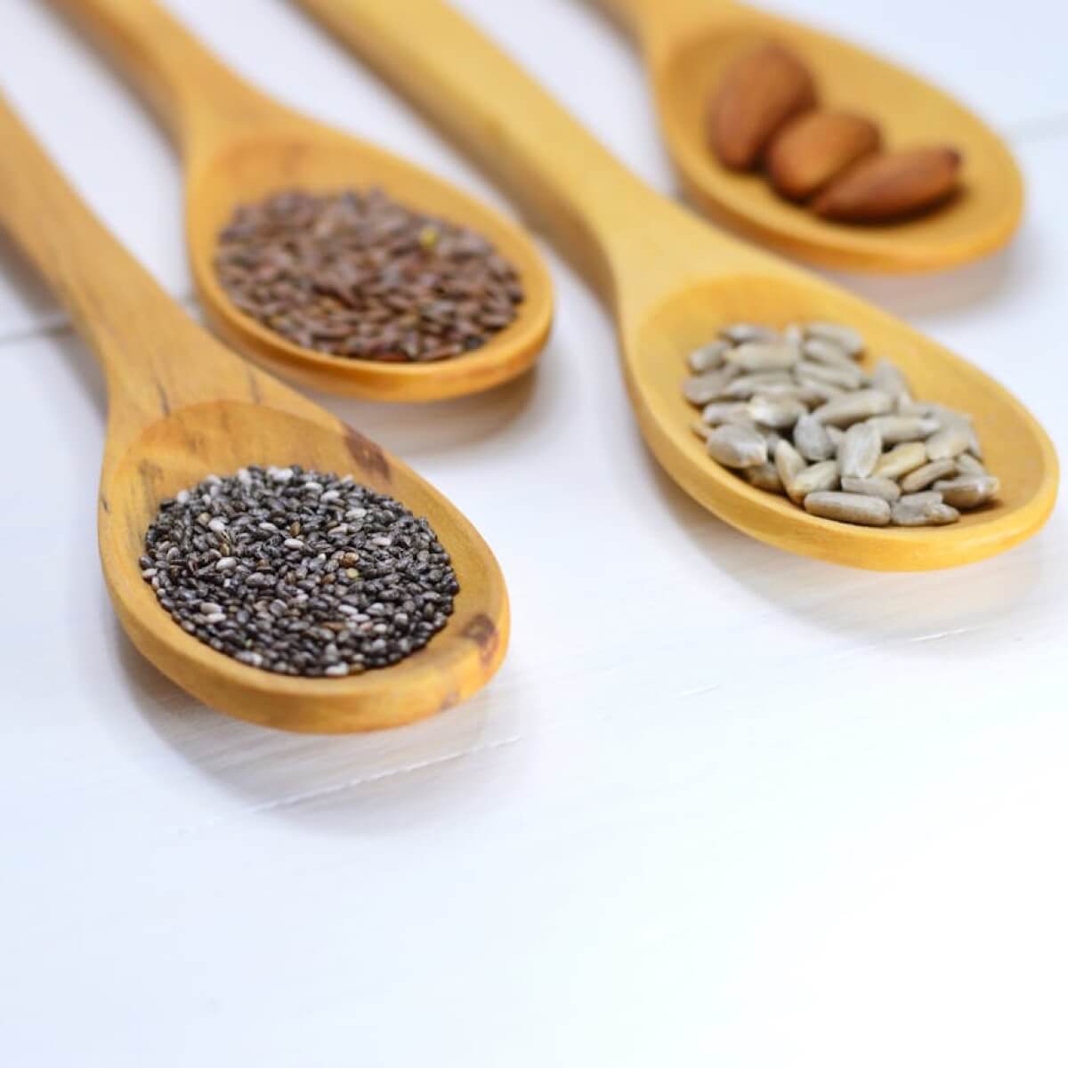 Spoons with nuts and seeds