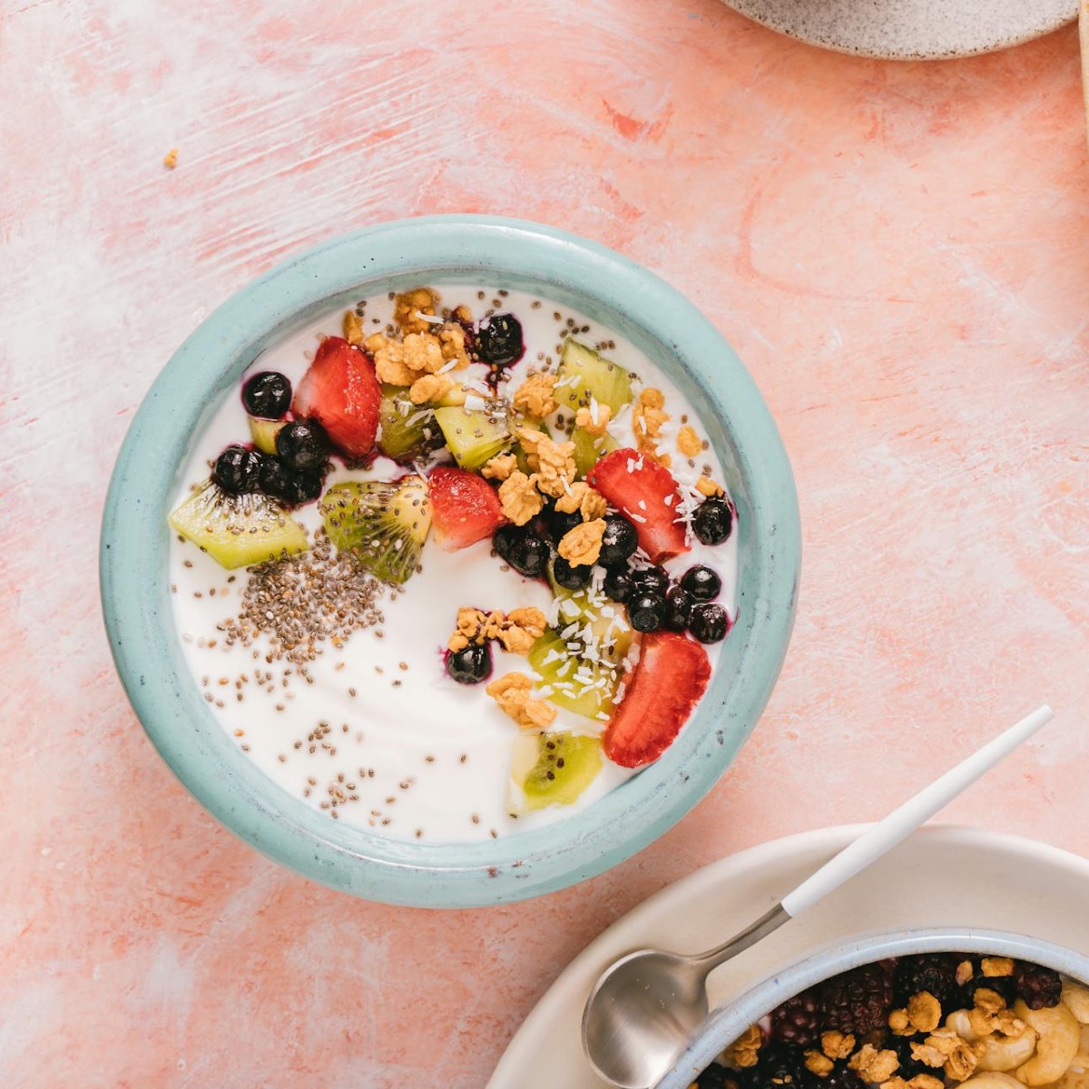 Yoghurt, berries, oats and seeds in a bowl